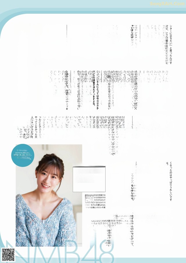 A magazine page with a picture of a woman smiling.